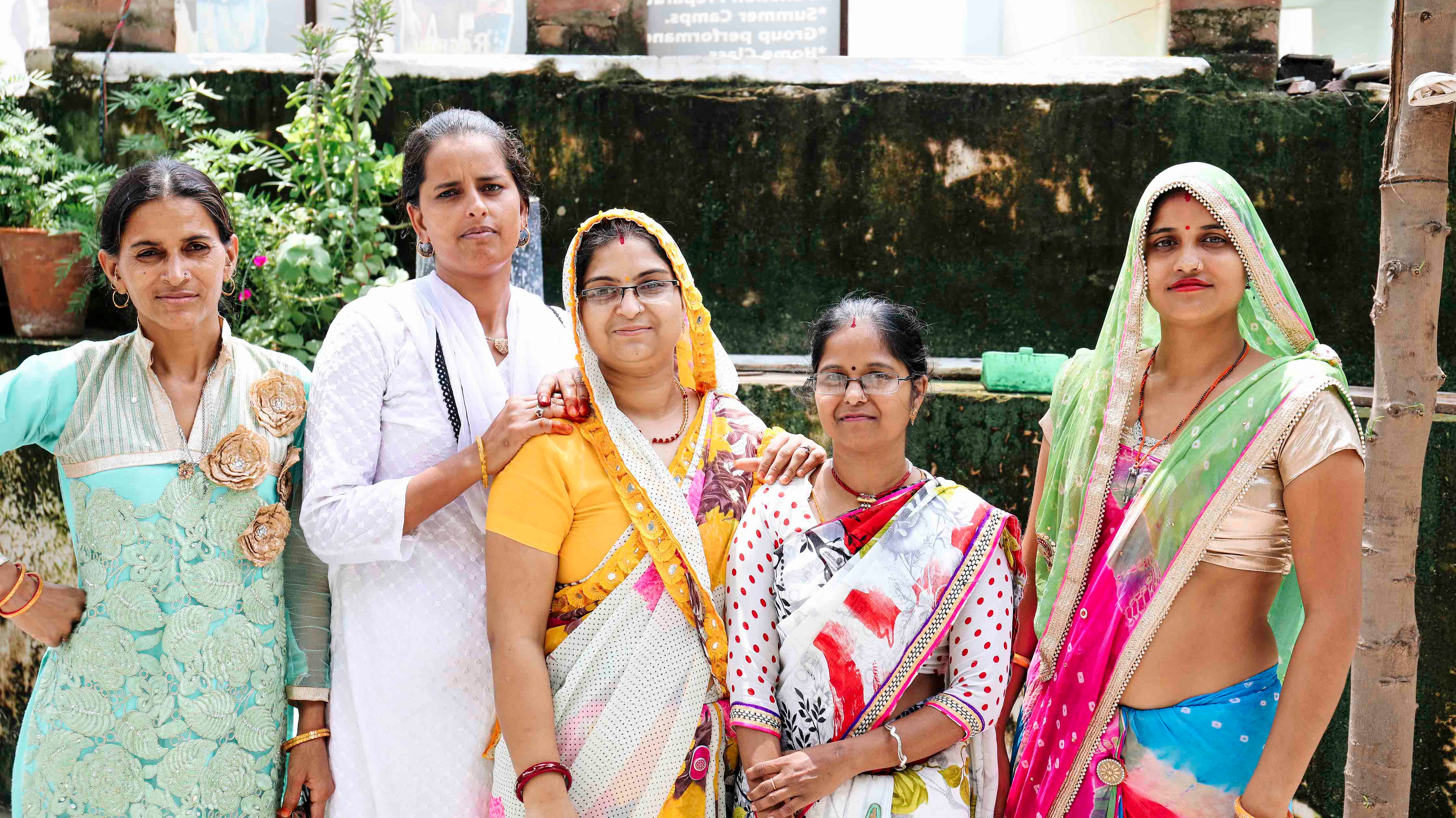 Anchal artisans gathered together smiling and empowered.