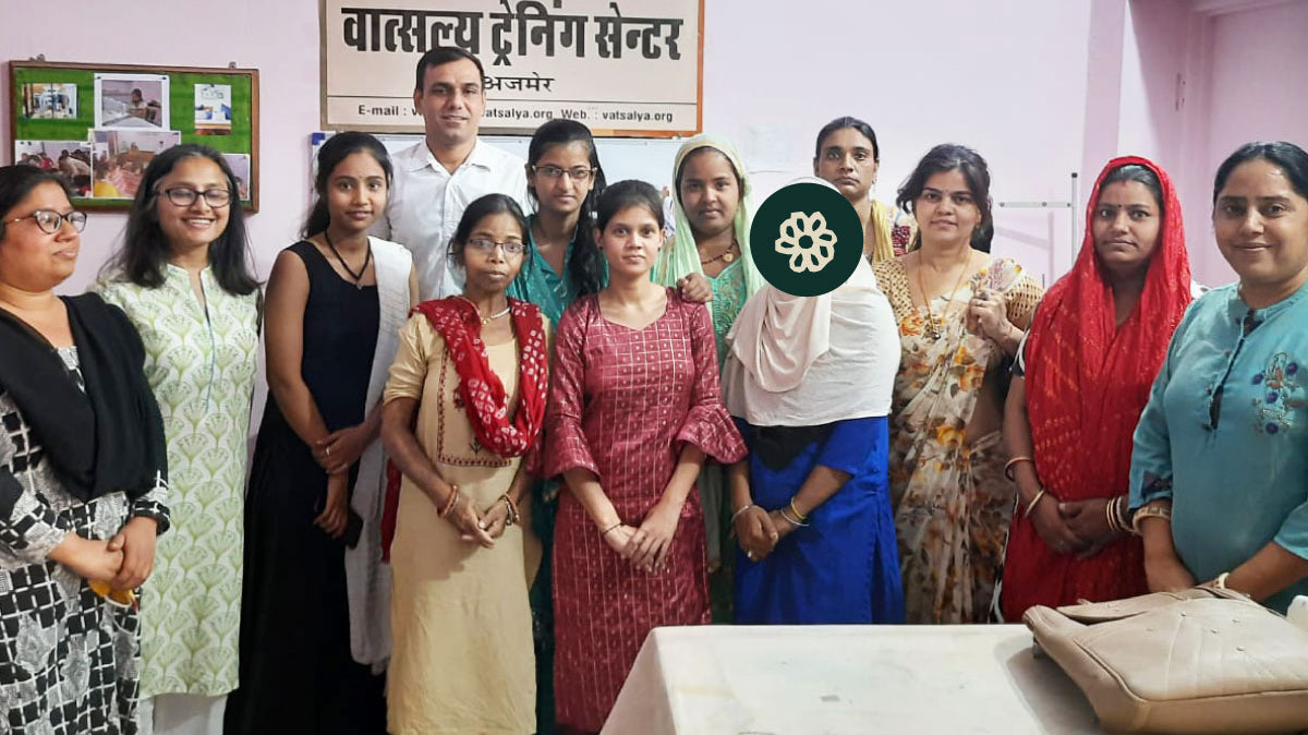 Anchal seamstress training program graduates of 9 with their instructors and community leaders