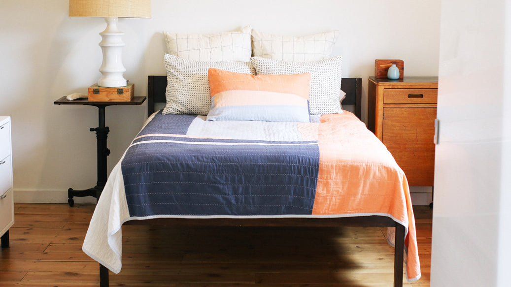 Anchal quilt from the Sari design of the Narrative Collection, styled in a bedroom