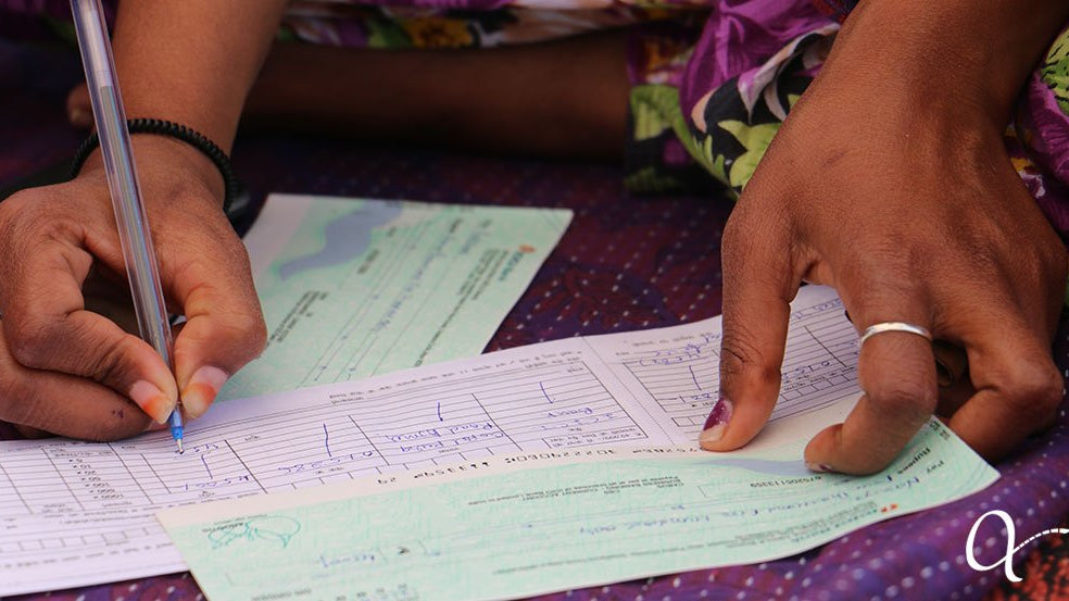 Anchal artisan doing financial work at an educational workshop made possible by the grant from Circle of Sisterhood