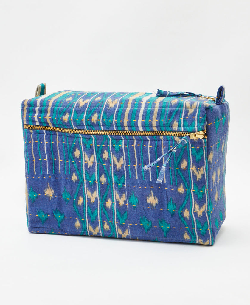 One-of-a-kind blue geometric floral kantha toiletry bag made
using recycled cotton saris