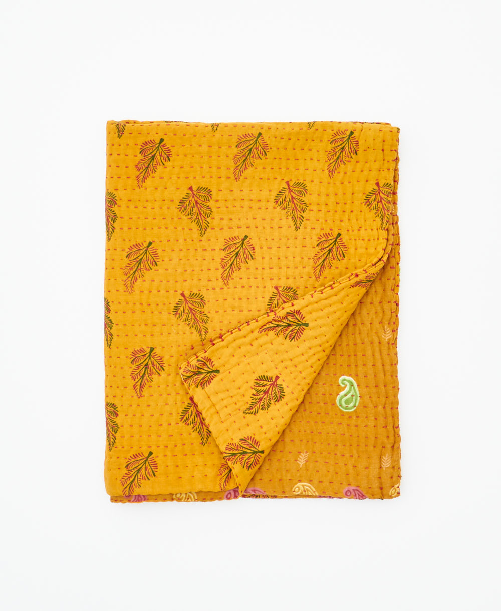 small kantha quilt handmade in India by women artisans from vintage cotton saris