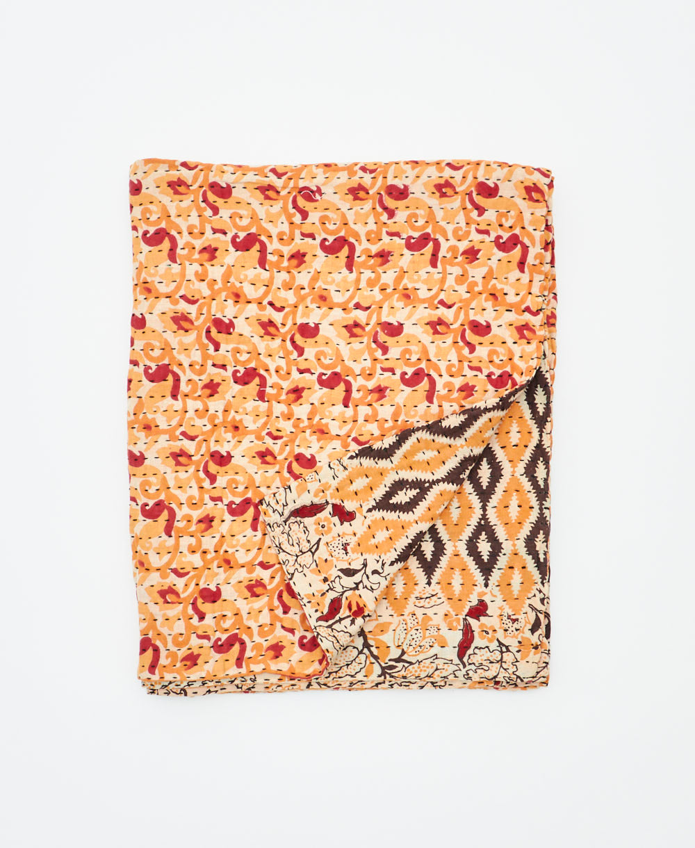small kantha quilt handmade in India by women artisans from vintage cotton saris