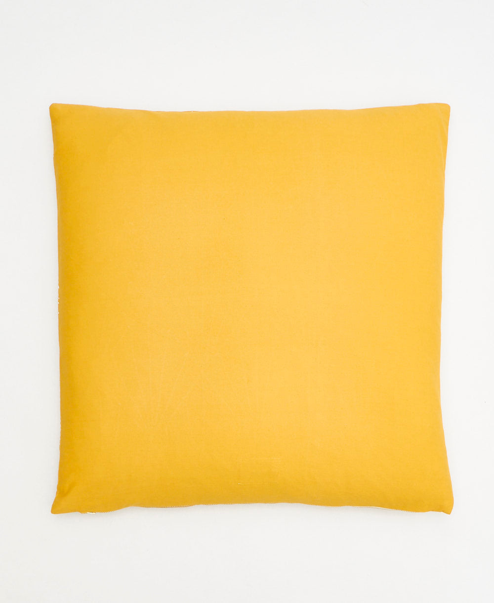 back of array throw pillow in mustard yellow in solid