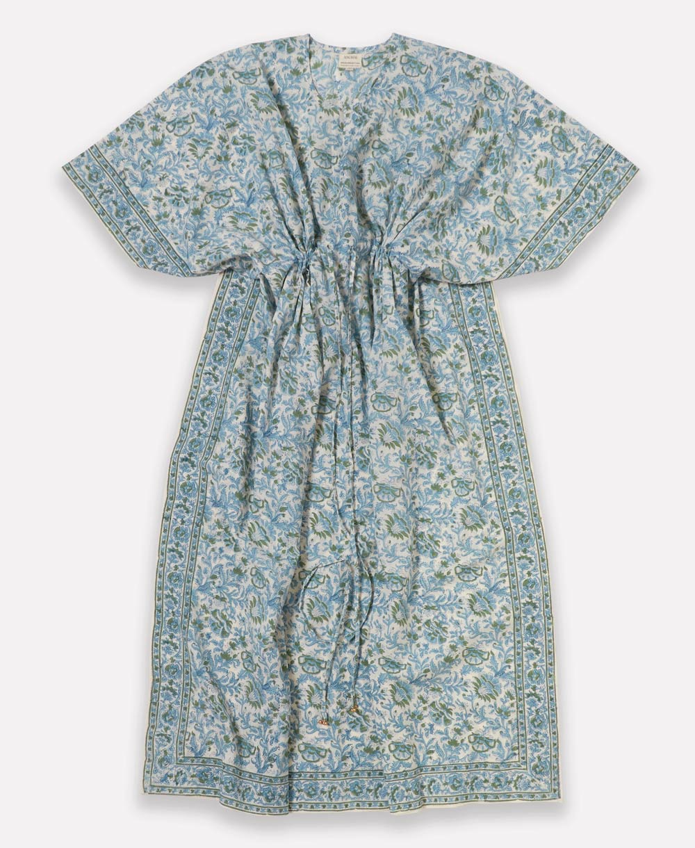 organic cotton kaftan in a blue and green floral print with a slit neckline, open sleeves and beaded waist ties