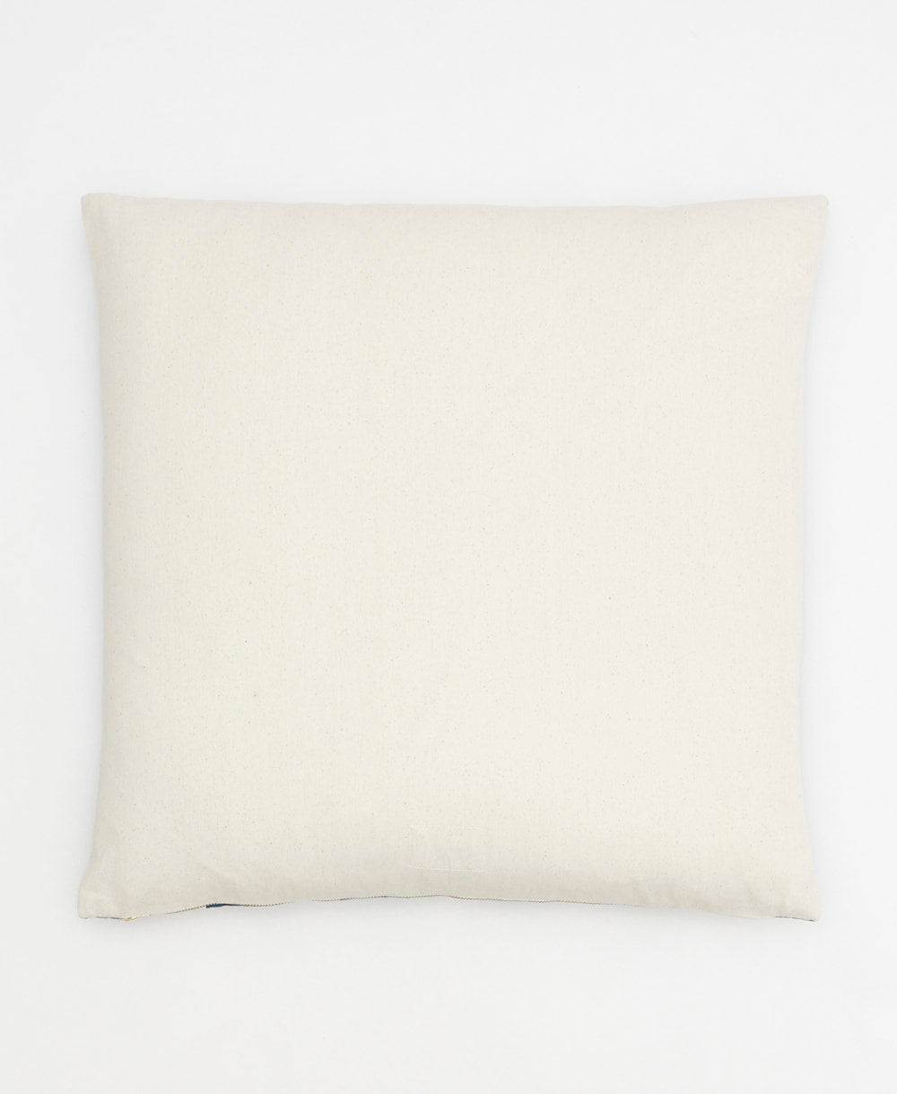 Beige pillow on a white background