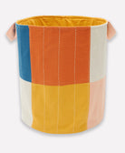 Colorful fabric basket with handles on a white background
