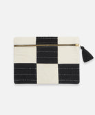 black and white checkered pouch clutch handmade in India complete with a black tassel and white embroidery