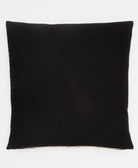 back of black cross-stitch euro sham