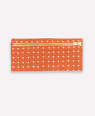 Orange pouch with white pattern and gold zipper on a white background