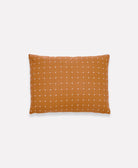 camel brown rectangular pillow with white cross-stitch embroidery handmade in India by women artisans