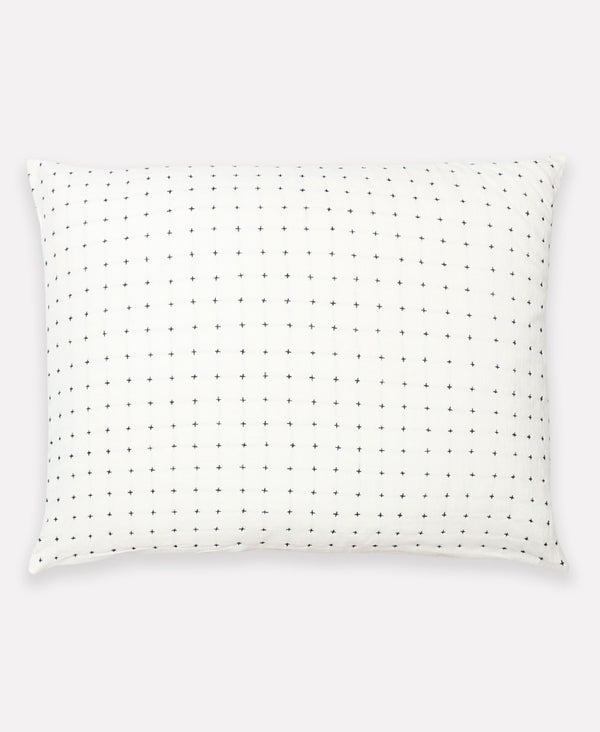 cross-stitch pillow sham in bone white with tiny cross-stitch embroidery