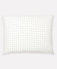 cross-stitch pillow sham in bone white with tiny cross-stitch embroidery