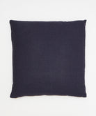 Navy blue pillow on a white background
