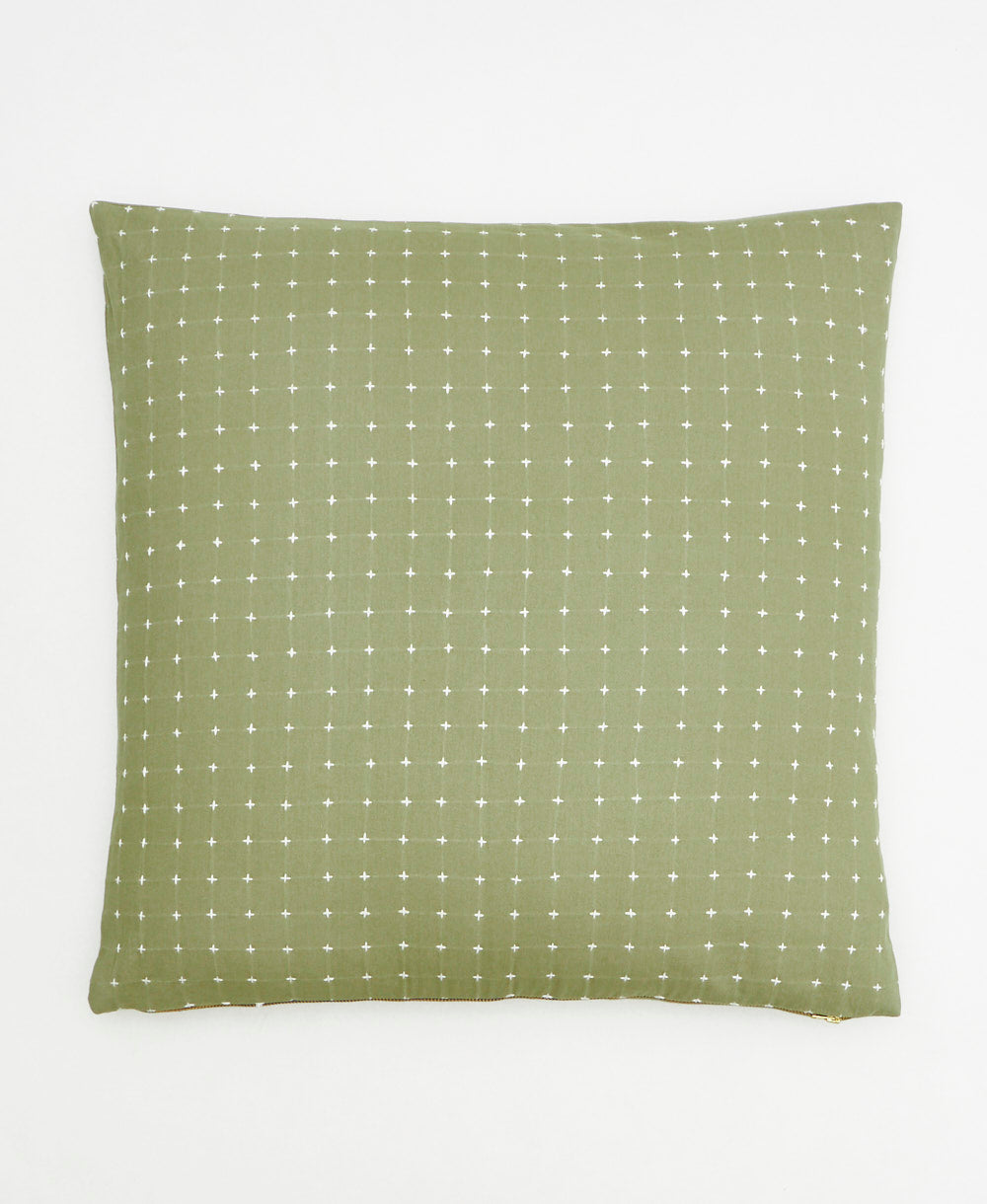 sage green modern throw pillow with white cross-stitch design