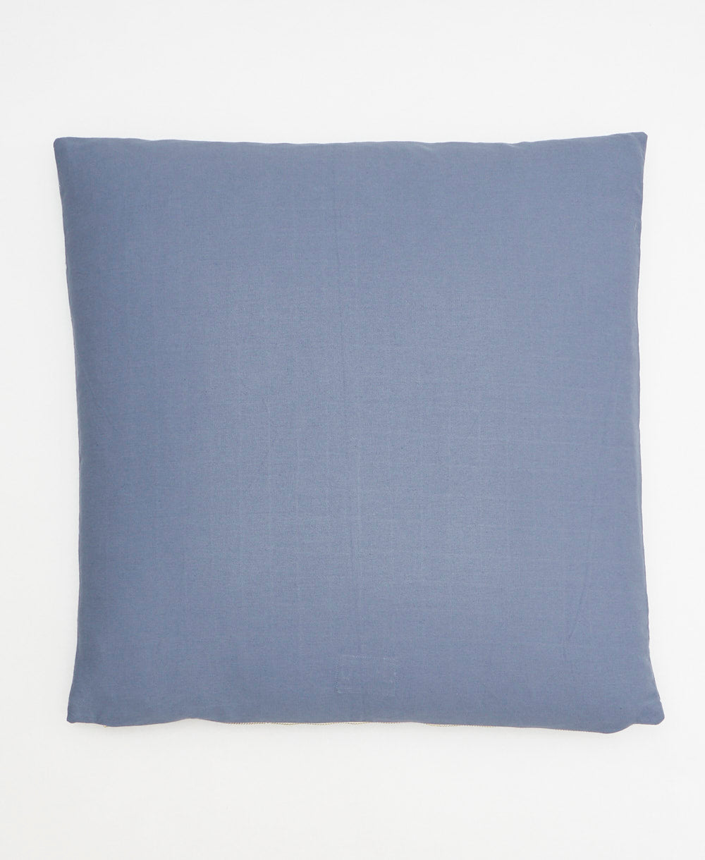 back of slate blue cross-stitch throw pillow in solid slate blue