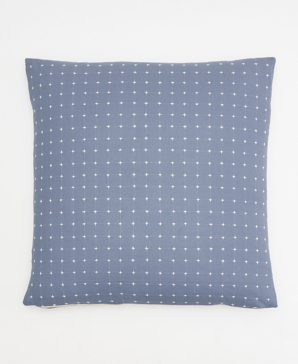 slate blue throw pillow with white cross-stitch embroidery hanmade in India from organic cotton