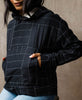 black organic cotton quilted hoodie with grid design by Anchal Project
