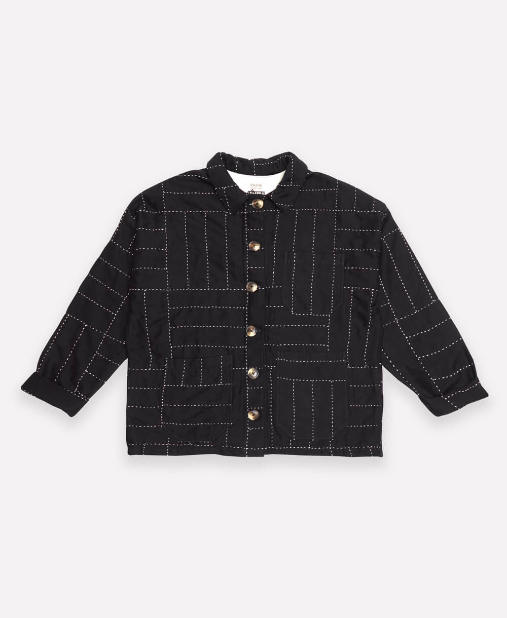 ethically made black quilted chore jacket with white crosshatch embroidery hand-stitched in India by women artisans