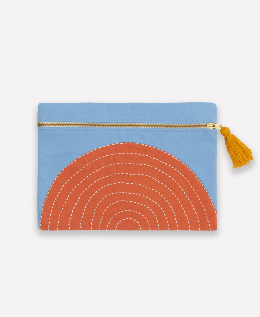 sky blue small pouch with orange eclipse and white hand-stitched embroidery