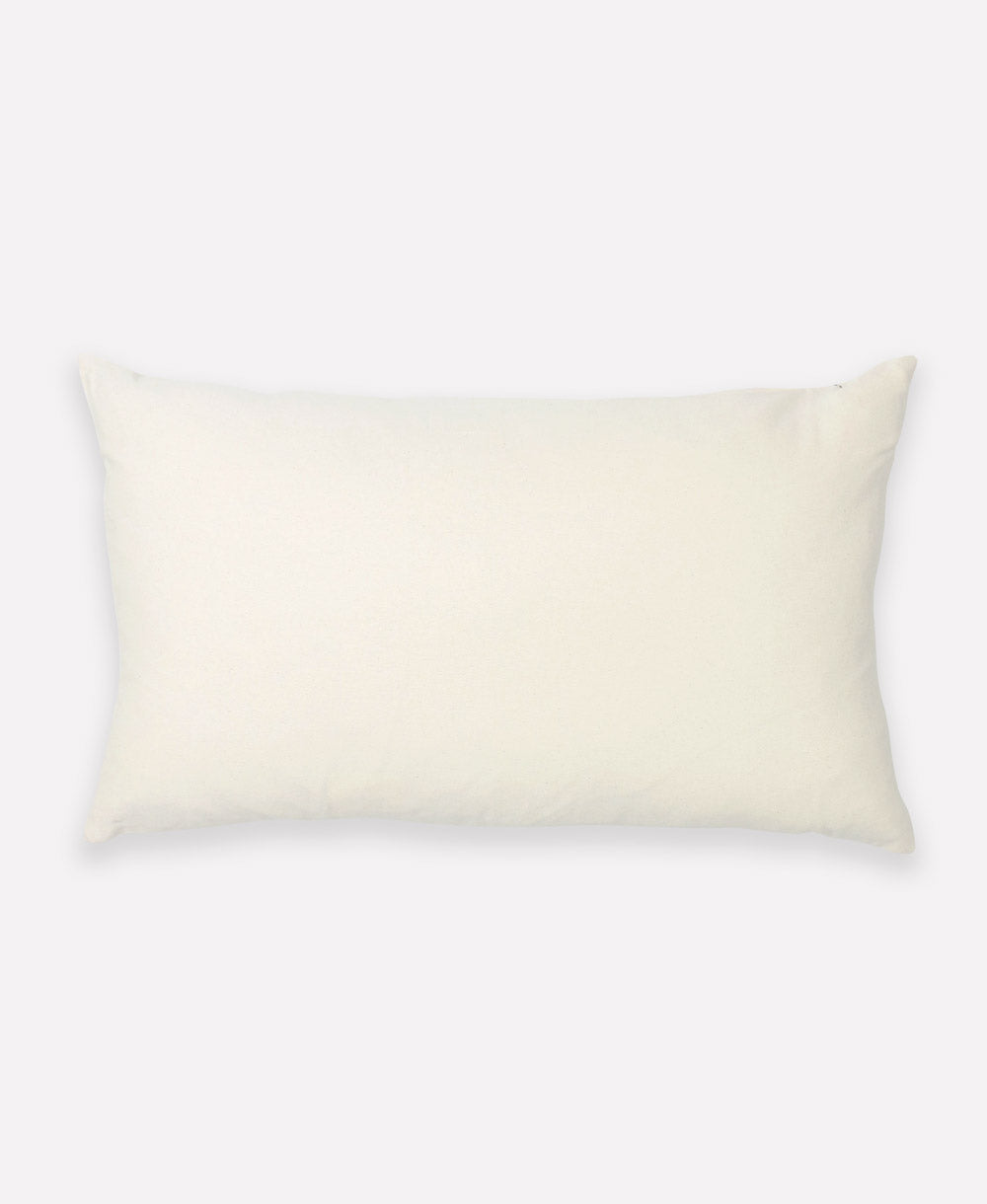 back of geometric lumbar throw pillow in white