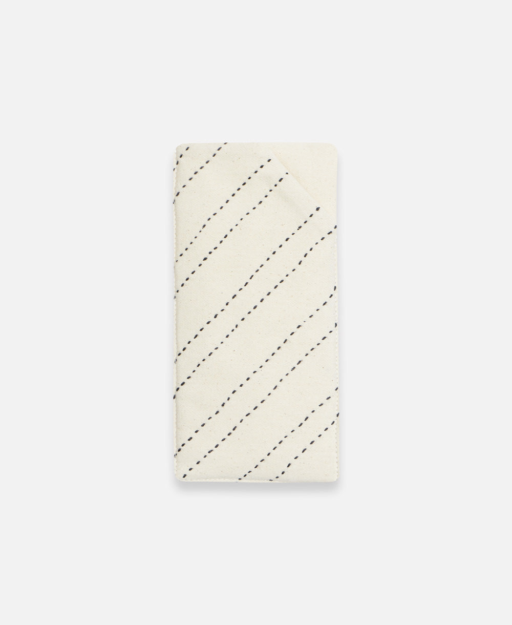 bone off-white glasses case with black hand-stitched embroidery by Anchal artisans