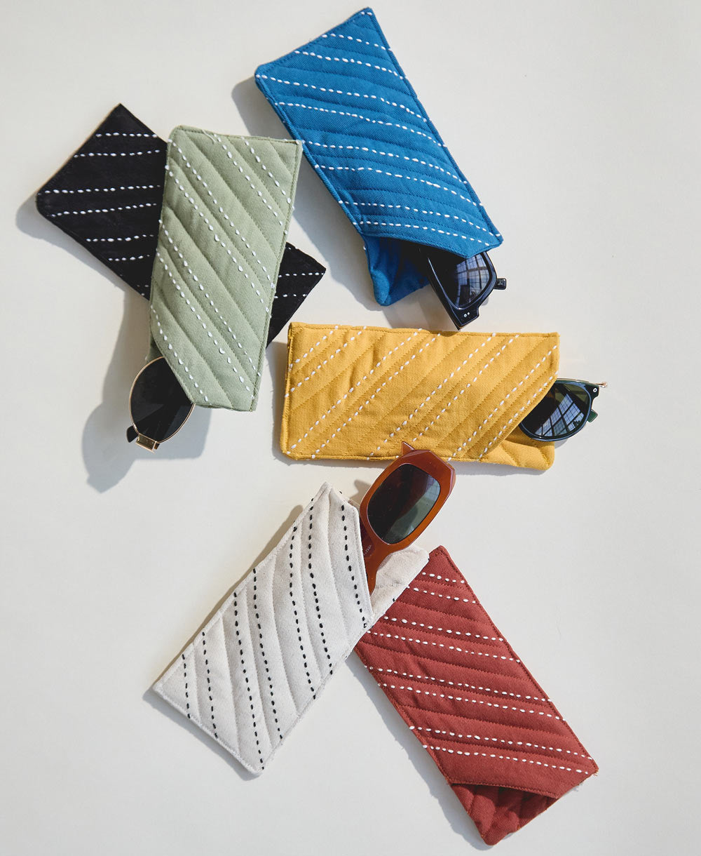 pile of padded cotton glasses cases