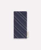 navy blue glasses case with white hand-stitched embroidery