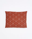 Rectangular pillow with a diamond pattern on a white background
