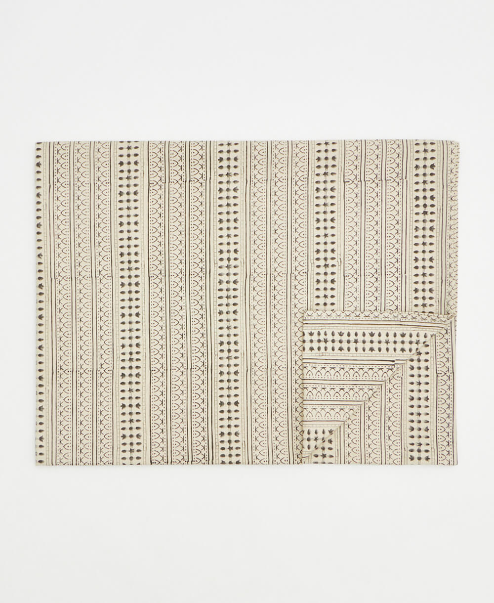Decorative rug with geometric pattern on a white background