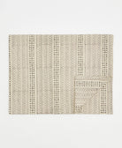 Decorative rug with geometric pattern on a white background