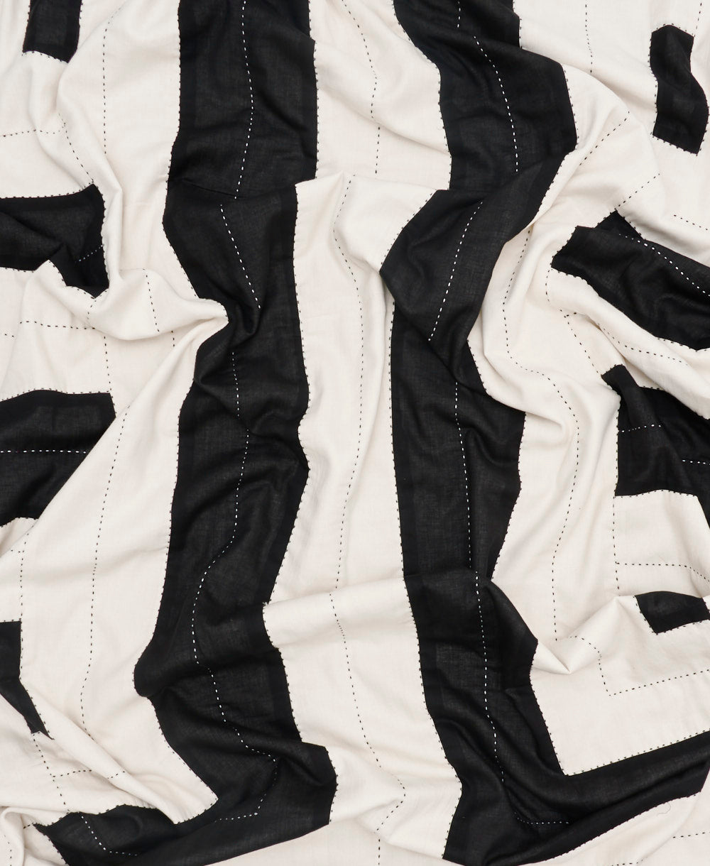 Close-up of black and white quilted fabric