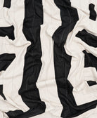 Close-up of black and white quilted fabric