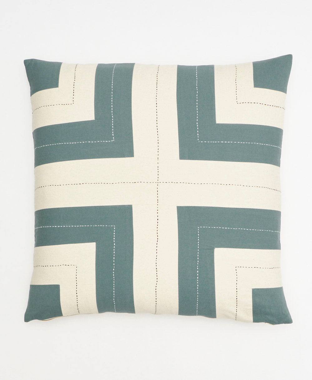 Decorative pillow with a geometric pattern on a white background