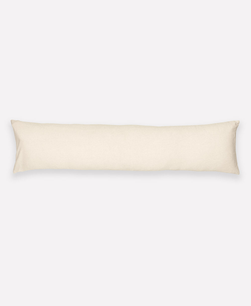 Beige body pillow on a white background