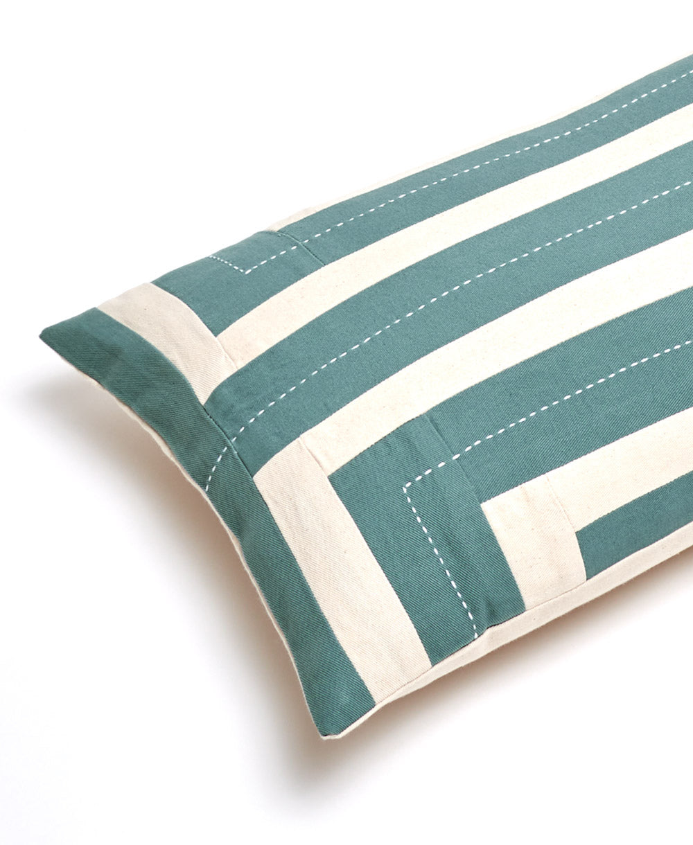 spruce green and white striped pillow on a white background