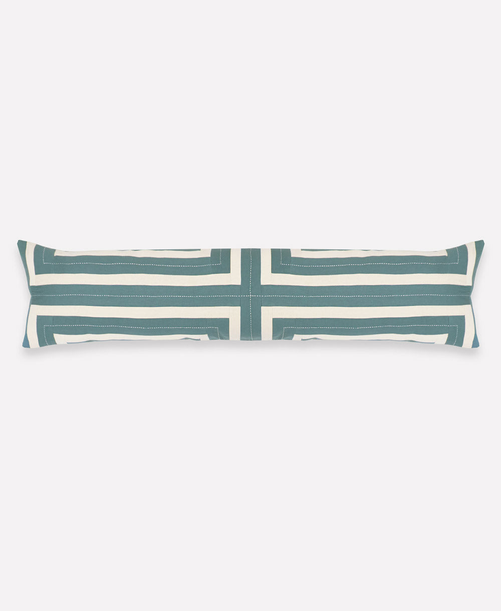 Long rectangular pillow with a blue and white striped pattern on a white background