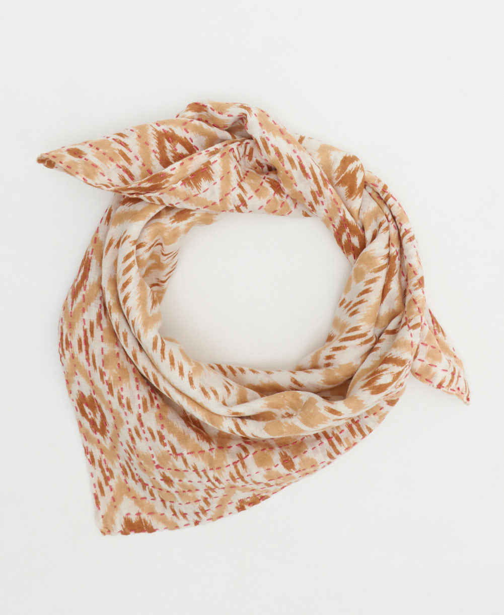 sustainable cotton bandana with hand-stitched embroidery around the edges