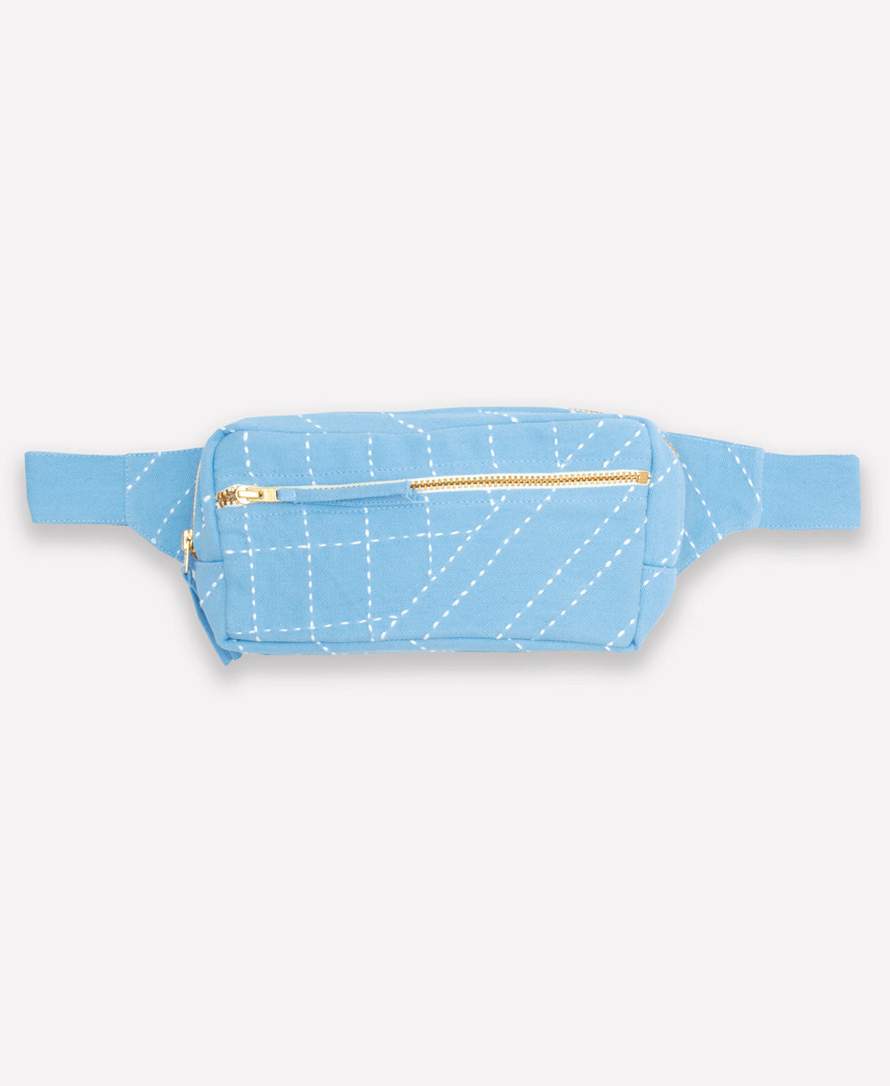Blue belt bag with white stitching on a light gray background