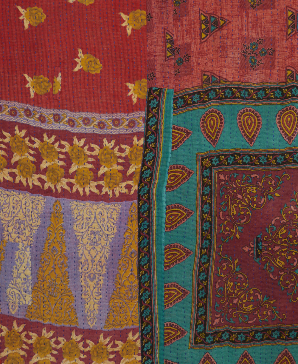 Kantha quilt throw featuring traditional kantha hand stitching