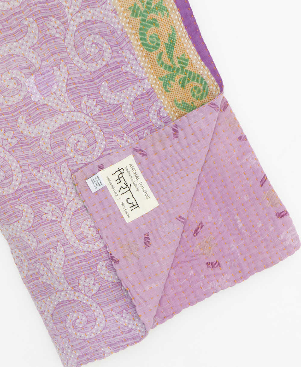 Kantha quilt throw featuring traditional kantha hand stitching