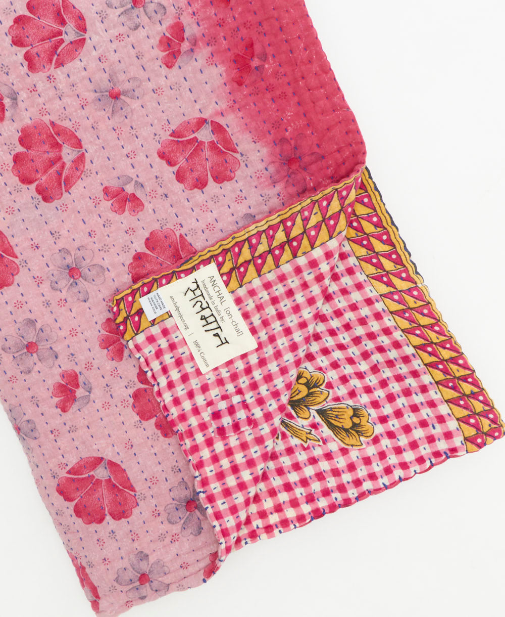 Kantha quilt throw featuring traditional kantha hand stitching