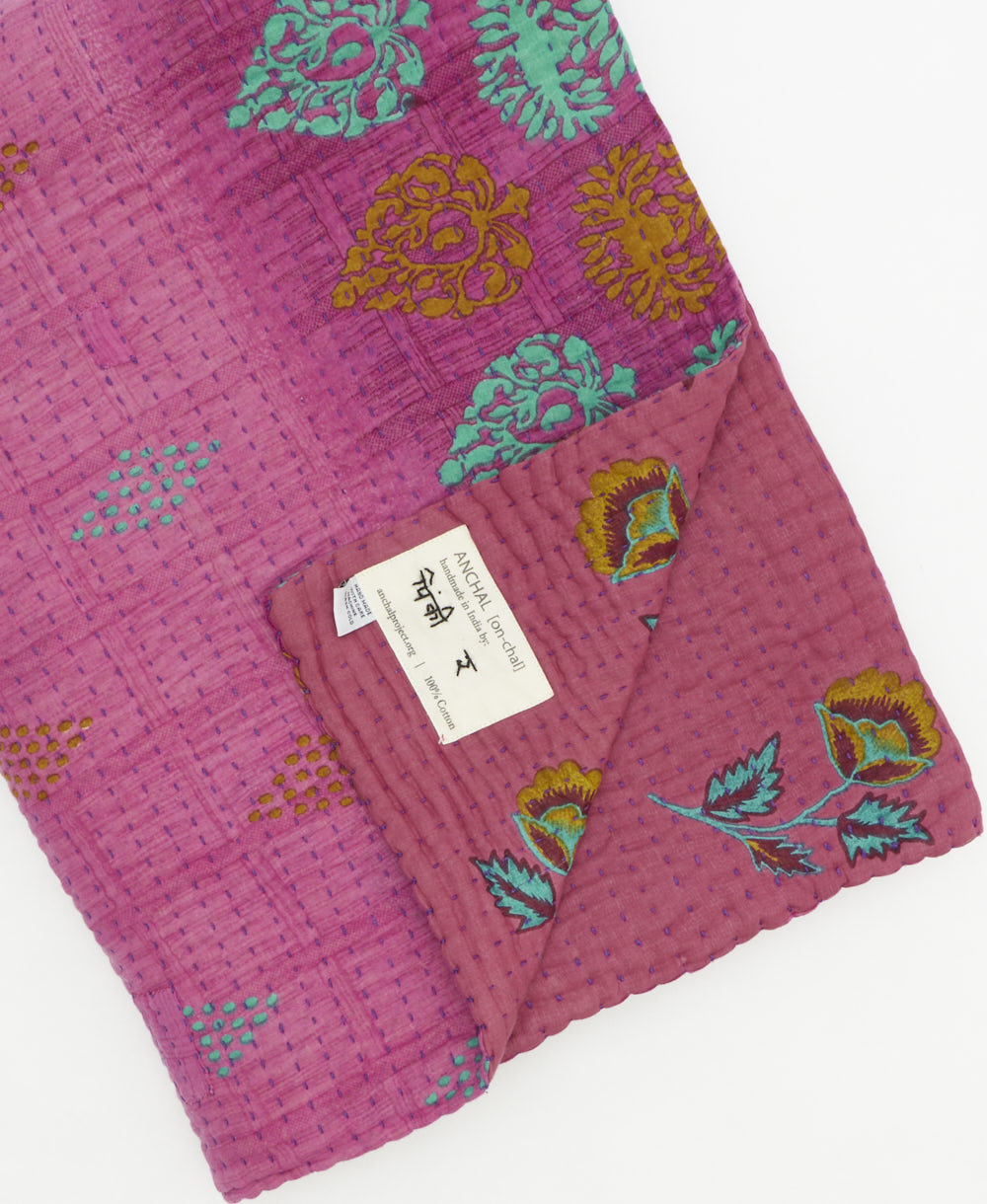 Kantha quilt throw featuring traditional kantha hand stitching