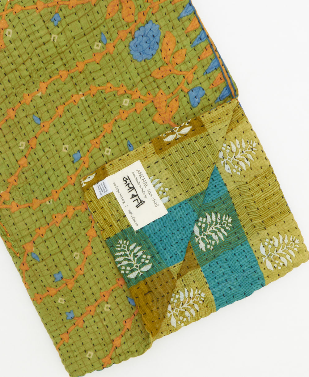 Kantha quilt throw featuring traditional kantha hand stitching