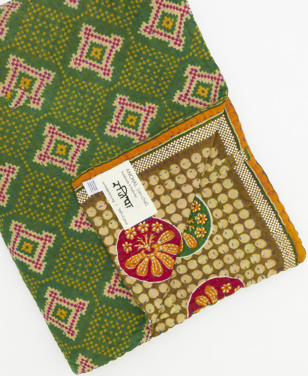 Kantha quilt throw featuring traditional kantha hand stitching
