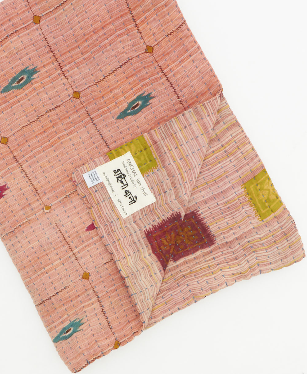 Kantha quilt throw featuring traditional kantha hand stitching