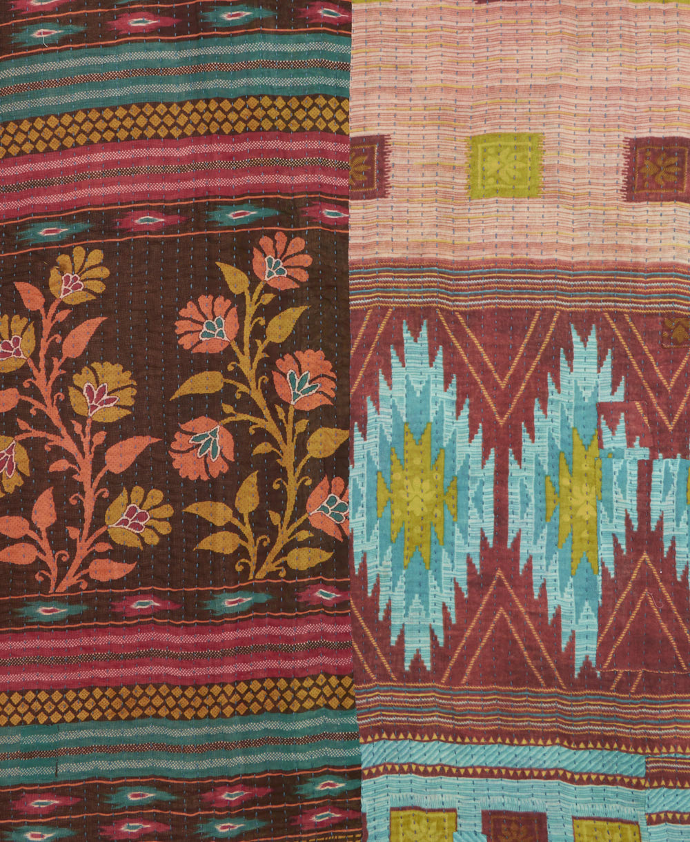 kantha quilt throw with a tag featuring the hand-stitched signature of the maker