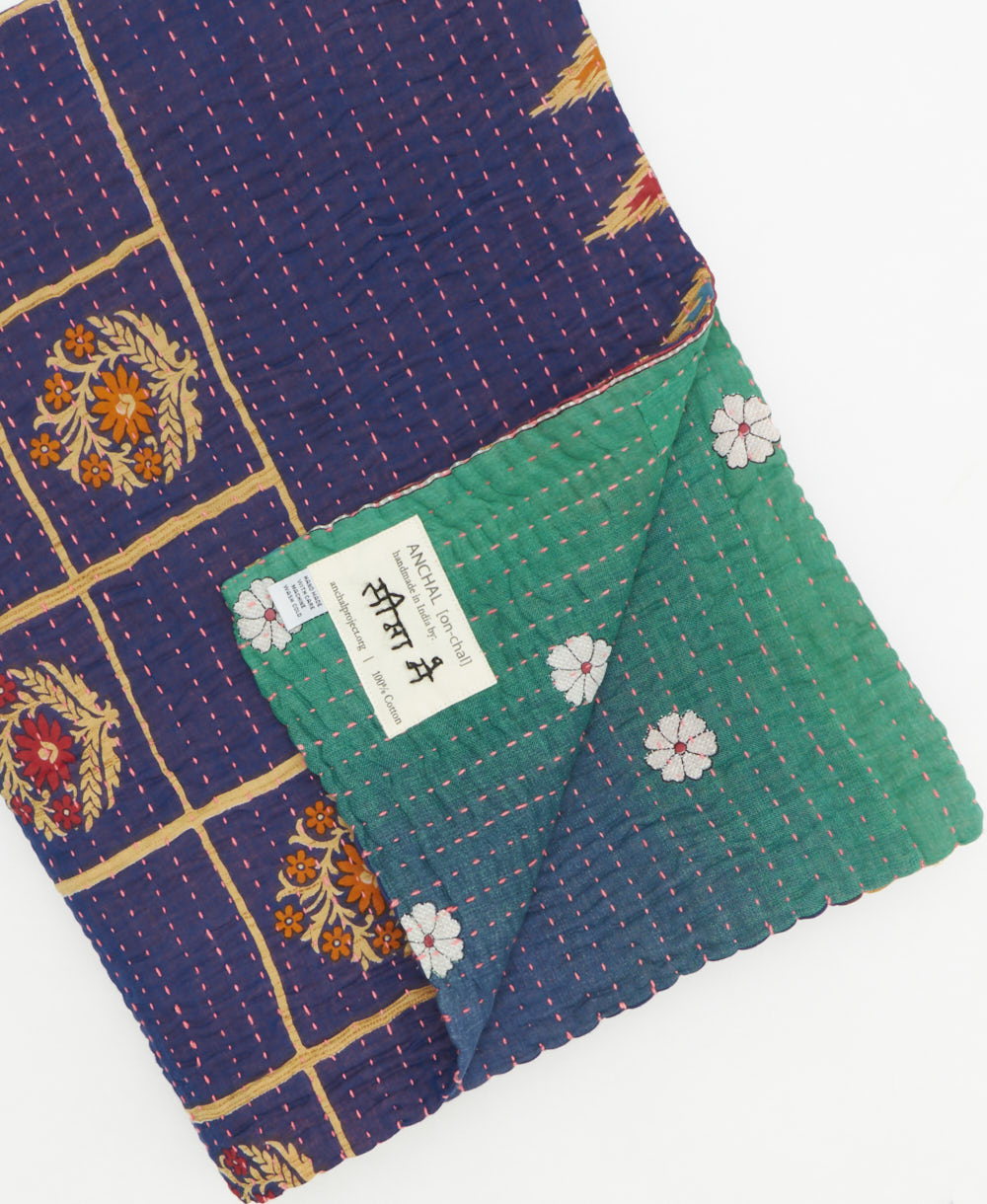 Kantha quilt throw featuring traditional kantha hand stitching