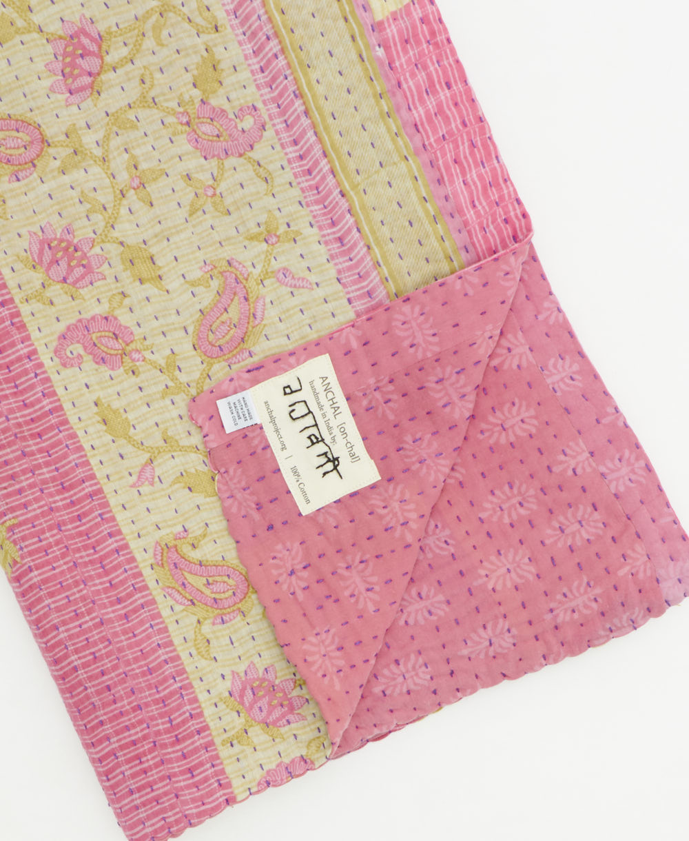 Kantha quilt throw featuring traditional kantha hand stitching