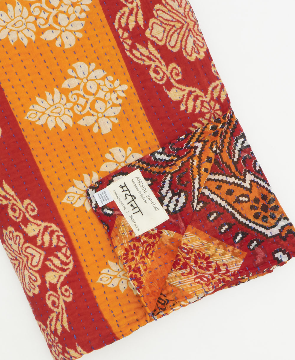 Kantha quilt throw featuring traditional kantha hand stitching